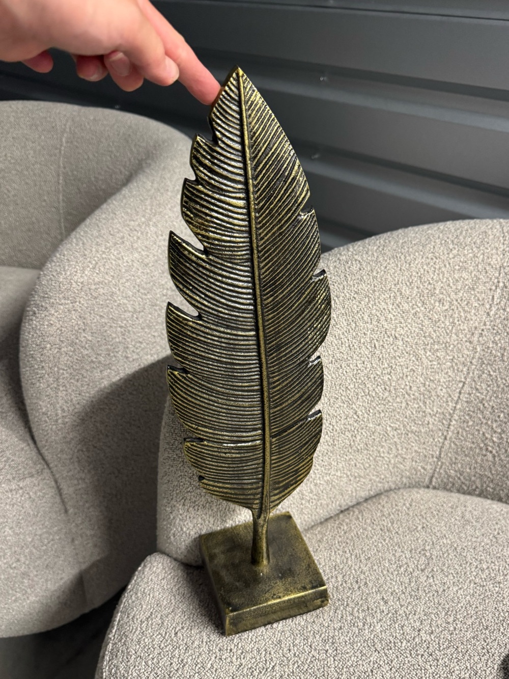 Brass standing feather decor